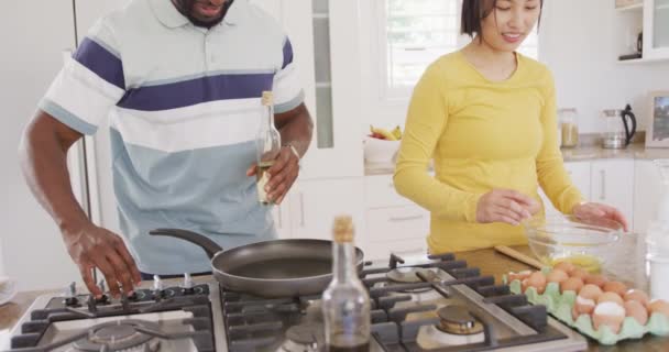 Happy Diverse Couple Cooking Preparing Breakfast Kitchen Spending Quality Time — Video