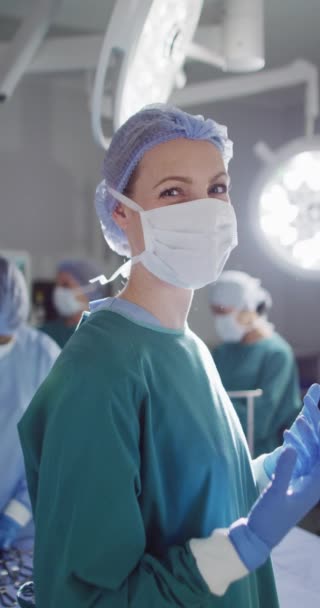 Vertical Video Portrait Diverse Surgeons Face Masks Global Medicine Health — Stockvideo