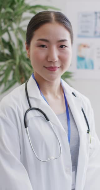 Vertical Video Portrait Happy Asian Female Doctor Global Medicine Health — 图库视频影像