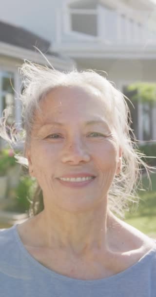 Vertical Video Portrait Happy Asian Senior Woman Sunny Day Garden — Video Stock