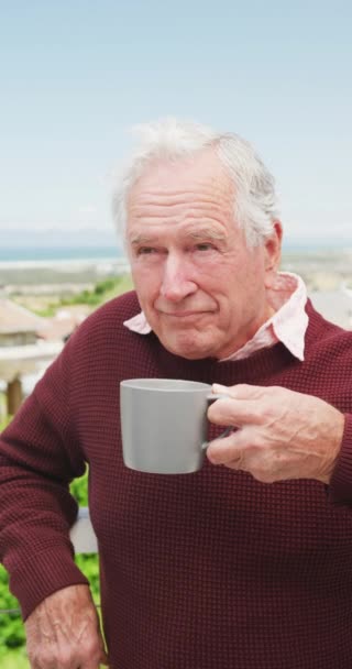 Vertical Video Happy Caucasian Senior Man Drinking Coffee Balcony Active — Vídeo de Stock