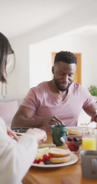 Vertical Video Happy Diverse Couple Table Having Breakfast Spending Quality — Vídeos de Stock