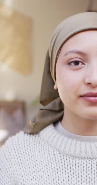 Vertical Video Half Face Portrait Smiling Biracial Woman Hijab Copy — Stockvideo