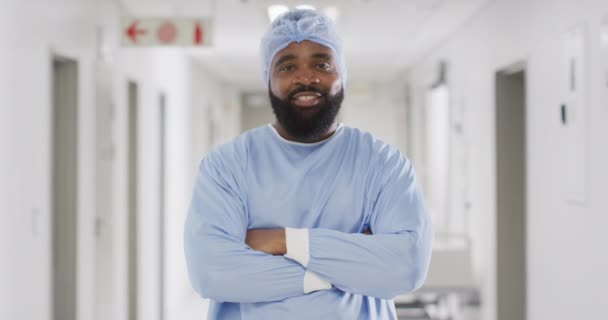 Video Portrait Smiling African American Male Doctor Surgical Cap Gown — Stockvideo
