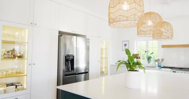 Video Modern Domestic Kitchen Fridge Freezer Hanging Lamps Central Island — Vídeo de Stock