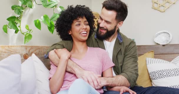 Video Portrait Happy Diverse Couple Sitting Living Room Embracing Smiling — Stock video