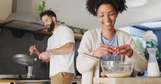 Video Happy Diverse Couple Laughing Cooking Breakfast Kitchen Copy Space — Video