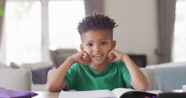 Happy African American Boy Sitting Table Having Online Lesson Spending — Vídeo de Stock