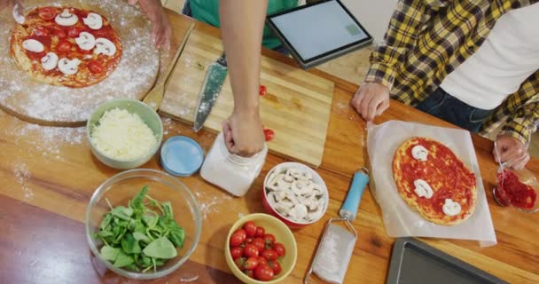 Diverse Male Teenage Friends Cooking Preparing Pizza Kitchen Slow Motion — Wideo stockowe
