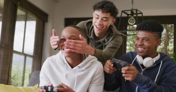 Happy Diverse Male Teenage Friends Playing Video Games Home Slow — Vídeos de Stock