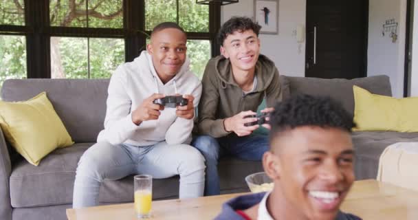 Happy Diverse Male Teenage Friends Playing Video Games Home Slow — Video