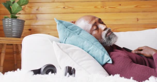 Happy Senior African American Man Spending Time Log Cabin Sleeping — Αρχείο Βίντεο