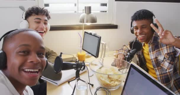 Portrait Happy Diverse Male Teenage Friends Using Laptop Recording Podcast — Video