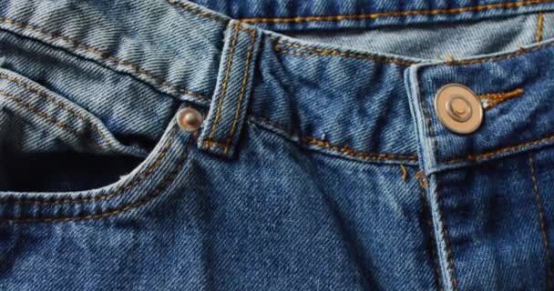 Close Van Jeans Grijze Achtergrond Met Kopieerruimte Denim Dag Materiaal — Stockvideo