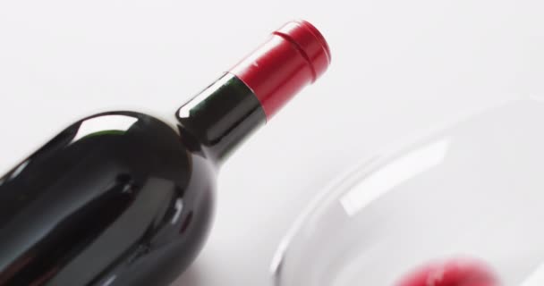 Red Wine Bottle Empty Glass Cork Corkscrew Lying White Surface — Videoclip de stoc