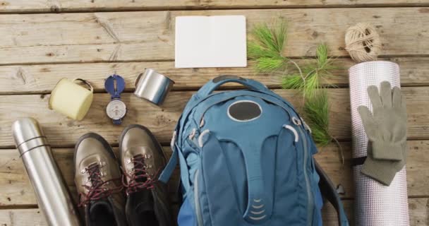 Camping Equipment Rucksack Boots Copy Space Wooden Background National Camping — Stockvideo