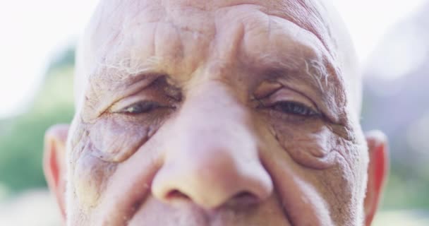 Portrait Close Senior Biracial Man Opening Eyes Wide Garden Slow — стоковое видео