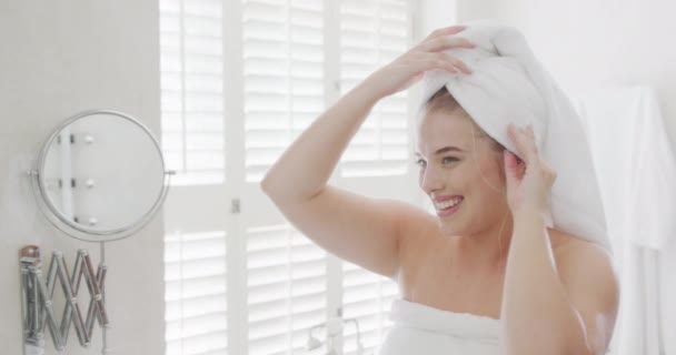 Happy Caucasian Size Woman Front Mirror Towel Head Slow Motion — Stock Video