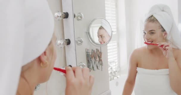 Happy Caucasian Size Woman Front Mirror Towel Head Brushing Teeth — Stock Video