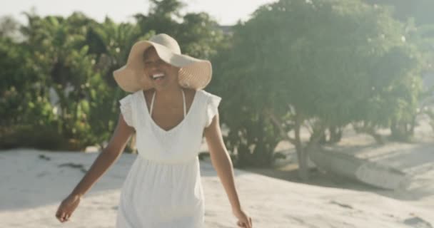 Portrait Happy Biracial Woman Sundress Sunhat Dancing Sunny Beach Slow — Stok Video