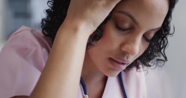 Stressed Biracial Female Nurse Leaning Wall Hospital Slow Motion Medicine — Stock Video