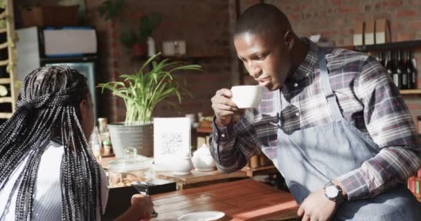 African American Male Female Baristas Drinking Coffee Talking Coffee Shop — Stock Video