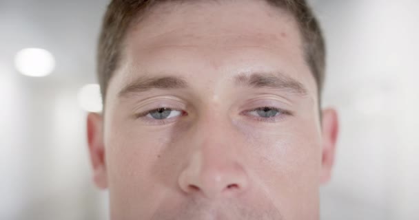 Unaltered Portrait Happy Caucasian Male Doctor Opening Eyes Looking Camera — Stock Video