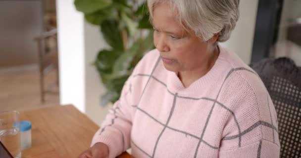 Senior Biracial Woman Using Tablet Medical Consultation Slow Motion Senior — Stock Video