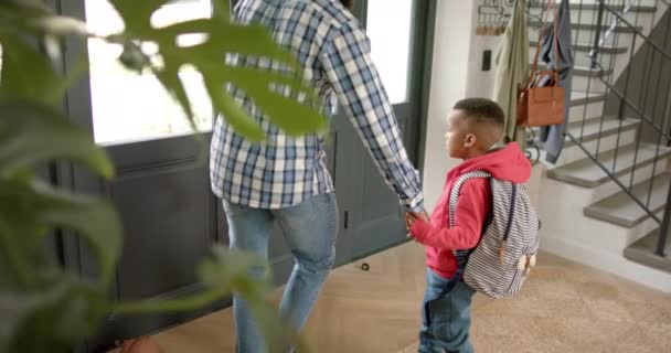 Happy African American Father Saying Goodbye Son Leaves House School — Stock Video