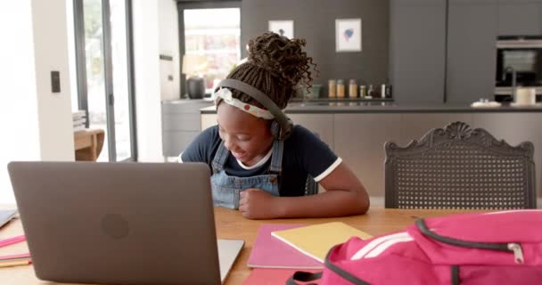 Happy African American Girl Using Headphones Laptop Raising Hand Online — Stock Video