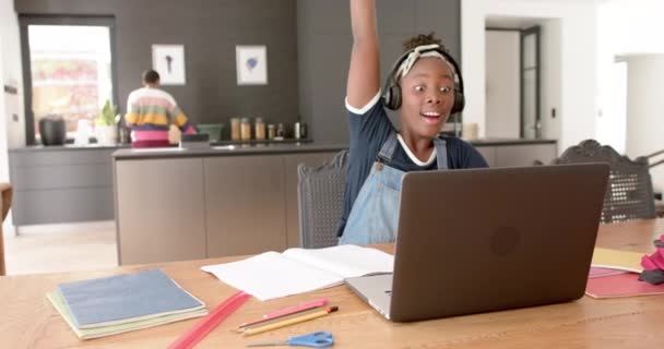 Happy African American Girl Using Headphones Laptop Rasing Hand Online — Stock Video