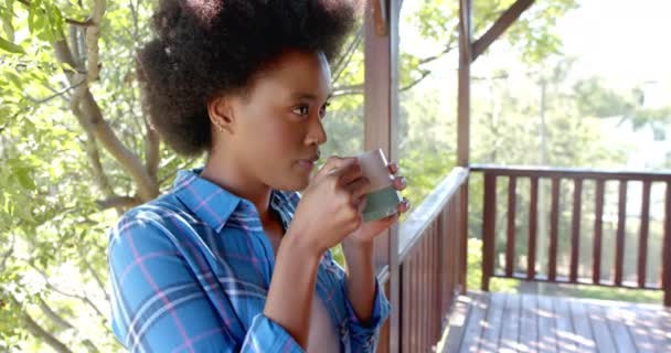Happy African American Woman Drinking Tea Sunny Terrace Slow Motion — Stock Video