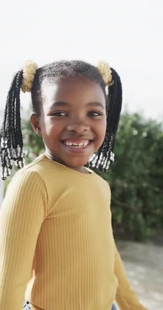 Vertical Video Portrait Happy African American Girl Smiling Sunny Terrace — kuvapankkivideo