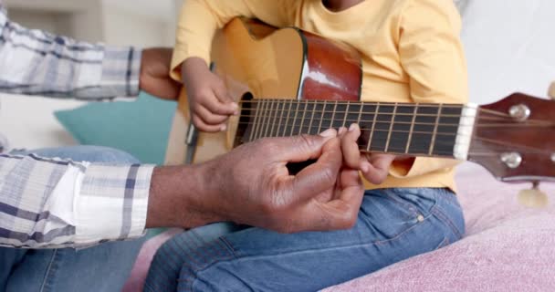 Happy African American Grandfather Grandson Playing Guitar Together Home Slow — Stock Video