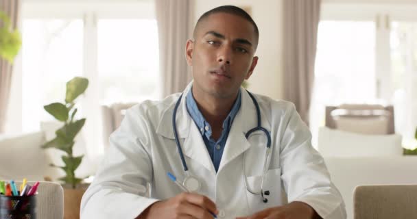 Biracial Male Doctor Making Video Call Bright Room Slow Motion — Stock Video
