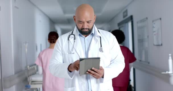 Portrait Happy Biracial Male Doctor Wearing Lab Coat Using Tablet — Stock Video