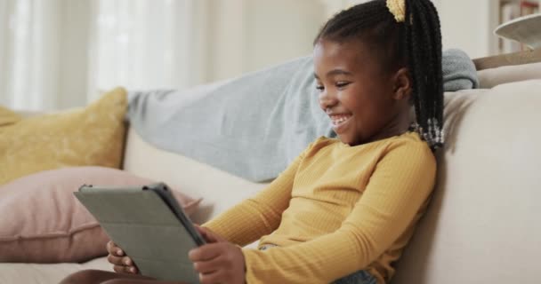 Happy African American Girl Using Tablet Sitting Sofa Home Slow — Vídeos de Stock