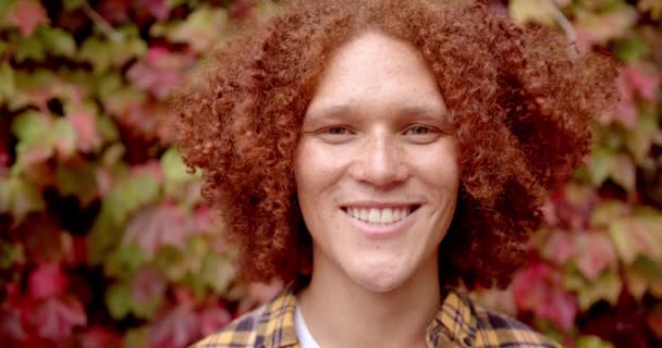 Portrait Happy Biracial Man Curly Red Hair Freckles Smiling Garden — Stock Video