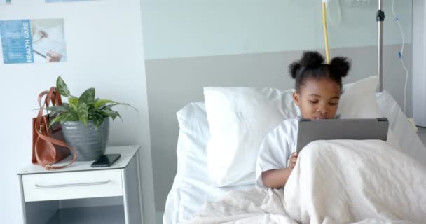 African American Girl Using Tablet Hospital Bed Copy Space Slow — Stock videók