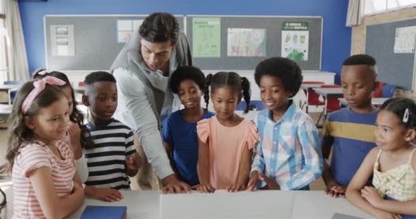 Happy Diverse Male Teacher Children Using Laptop Elementary School Class — Video Stock