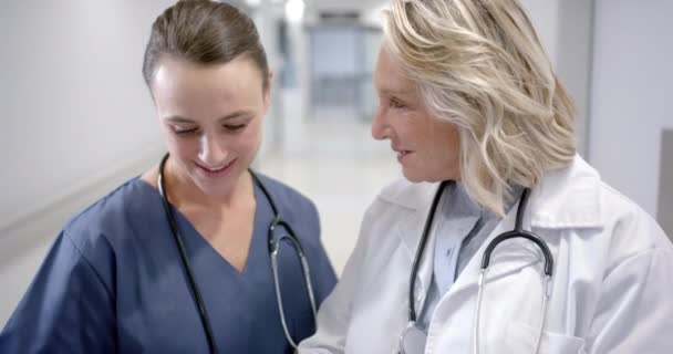 Caucasian Female Doctors Discussion Hospital Corridor Slow Motion Medicine Healthcare — Video Stock
