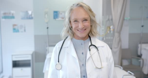 Portrait Happy Senior Caucasian Female Doctor Hospital Room Slow Motion — Stock video