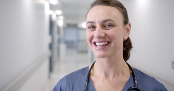 Portrait Happy Caucasian Female Doctor Hospital Corridor Slow Motion Medicine — стокове відео