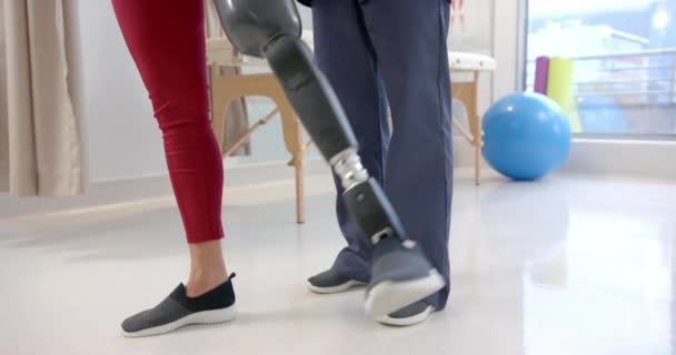 Caucasian Female Physiotherapist Female Senior Patient Prosthetic Leg Exercising Prosthetics — Stock Video