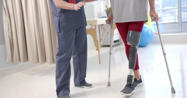 Caucasian Female Physiotherapist Female Senior Patient Prosthetic Leg Exercising Prosthetics — Video