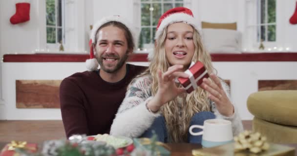 Happy Diverse Couple Wearing Santa Hats Having Christmas Video Call — Stock Video