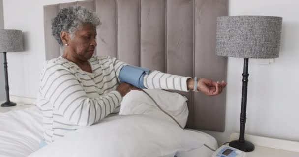 Senior African American Woman Checking Blood Pressure Slow Motion Senior — Stock Video