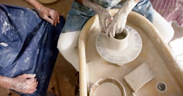 Hands Diverse Male Potters Using Potter Wheel Pottery Studio Slow — Stock Video