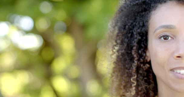 Half Portrait Biracial Woman Curly Hair Smiling Sunny Garden Slow — Stock Video