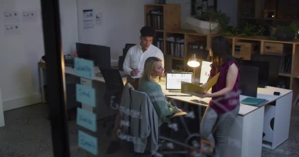 Diverse Business Team Collaborates Modern Office Working Late Setting Includes — Stock Video